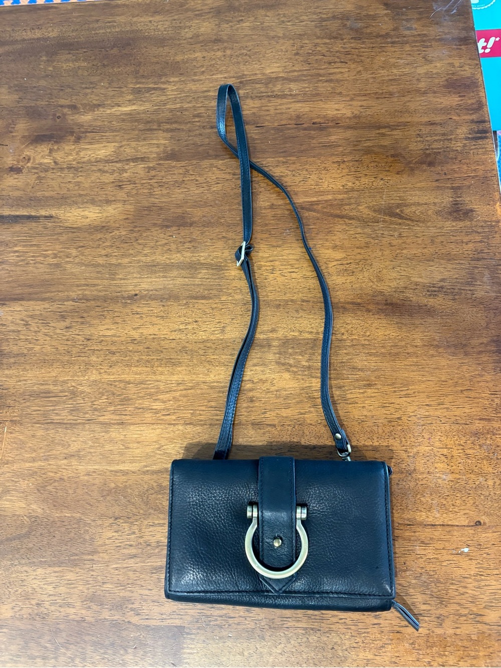 Black Leather Crossbody Bag with Gold Ring Detail